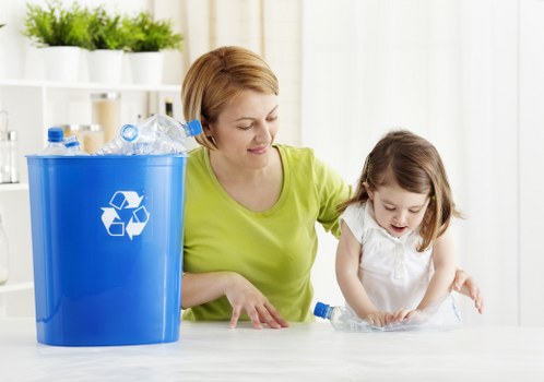 Business professionals discussing waste management with a skip hire provider